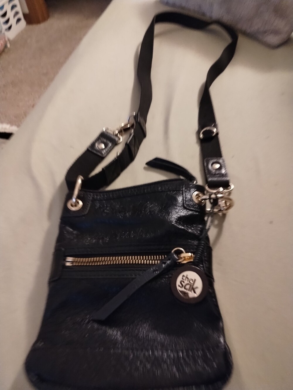 The Sak Black Distressed  Leather sm. Crossbody shoulder Bag. adj.strap.